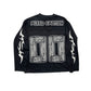 Black Lightning long sleeve top with a relaxed, oversized fit and bold graphic print