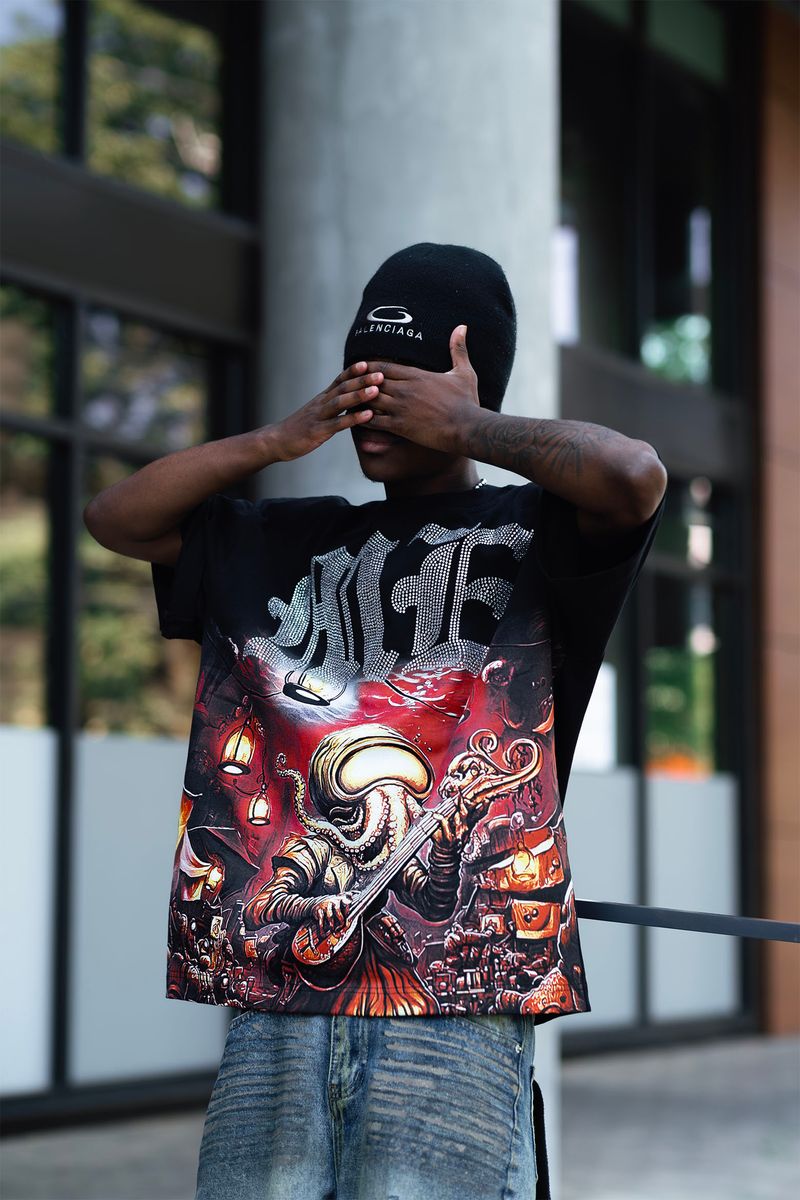 Full view of the Octopus Rhinestone Tee showcasing its comfortable fit and stylish black fabric
