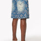 Front view of classic blue wash denim shorts adorned with all-over embellishments for a luxe look
