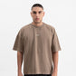 A brown oversized PURE Knockout Gloves T-shirt made from 100% cotton with 250g fabric weight