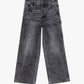 Valabasas Mr Straight Grey Denim Jeans displayed on a hanger in a retail store