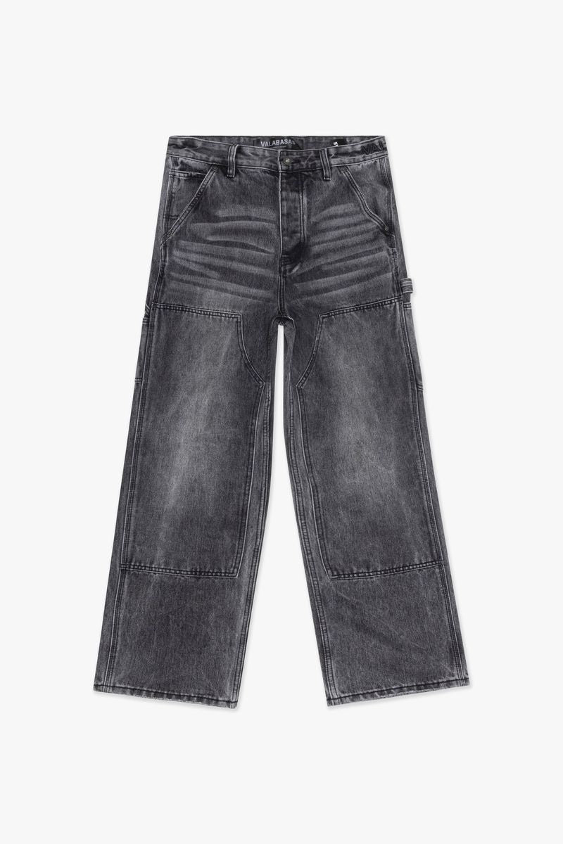 Valabasas Mr Straight Grey Denim Jeans displayed on a hanger in a retail store