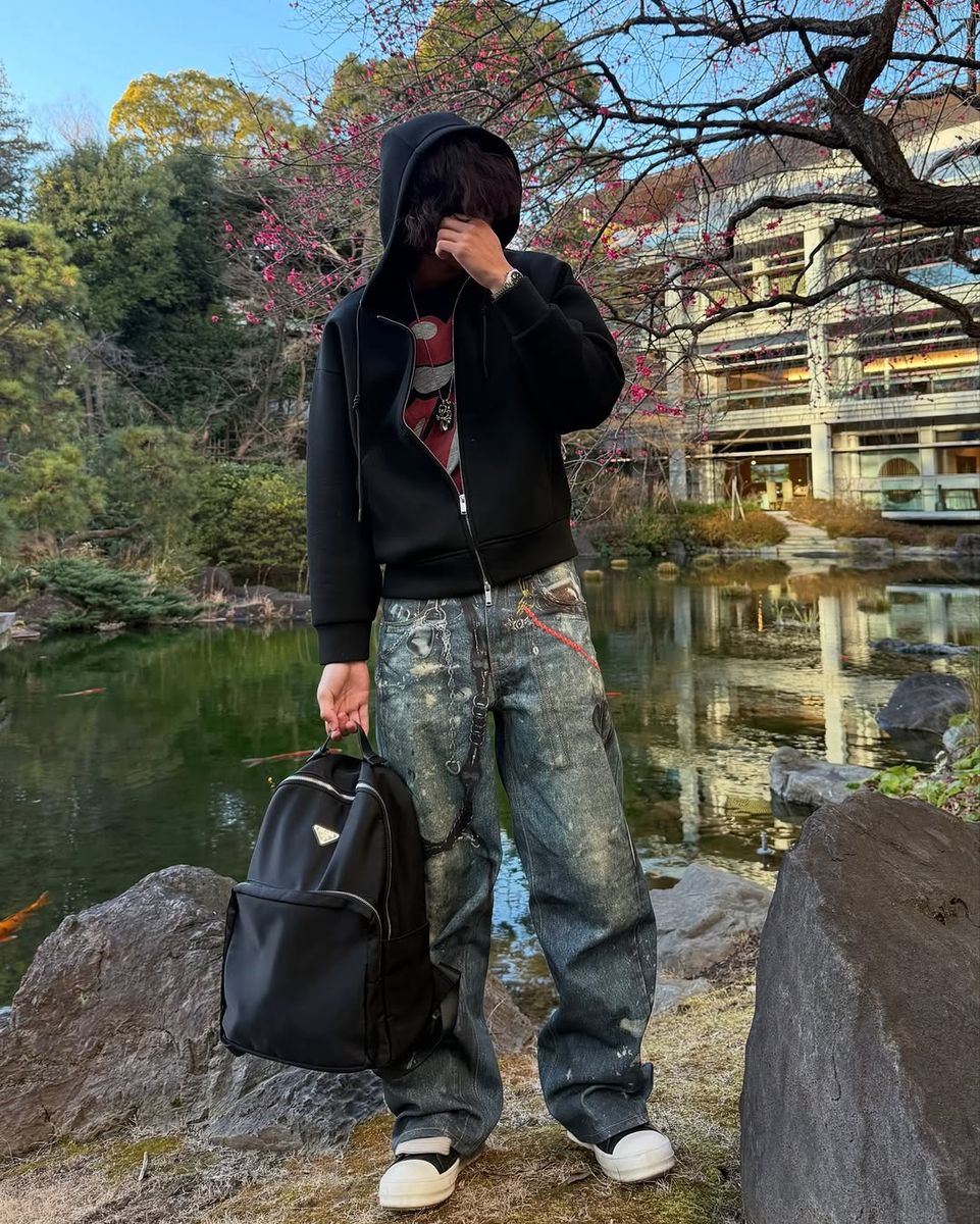 Wideboy Hardware Denim jeans in blue with relaxed fit, graphic print, and sandblast wash finish