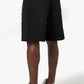 Stylish Guapi All Black Embellished Denim Shorts featuring intricate embellishments and a trendy fit for casual summer wear