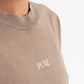 Photograph of the neckline of the PURE Knockout Gloves Brown T-shirt showing neat stitching and classic design
