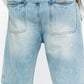 Detail of the distressed areas and fading effects on Valabasas Mr Shorts light blue denim shorts