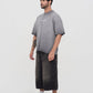  Image illustrating the oversized design and washed grey color of the PURE Áurea T-shirt perfect for casual wear