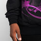 Close-up of the Guapi Cyber Pink Hoodie logo on the sleeve