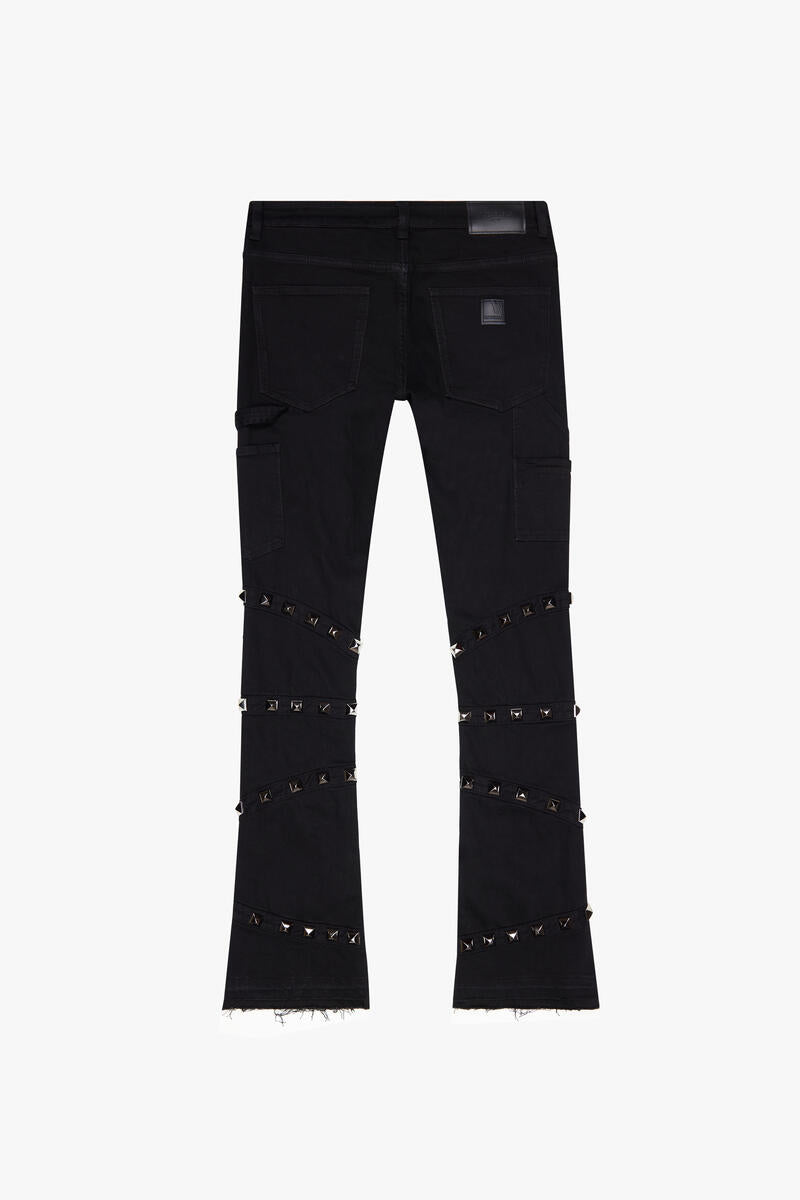 Close-up of the front of Valabasas Pyrgos Black Stacked Denim Jeans