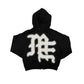 Close-up of the End rhinestone design on the black mixed emotion hoodie showcasing intricate detailing and shimmering embellishments