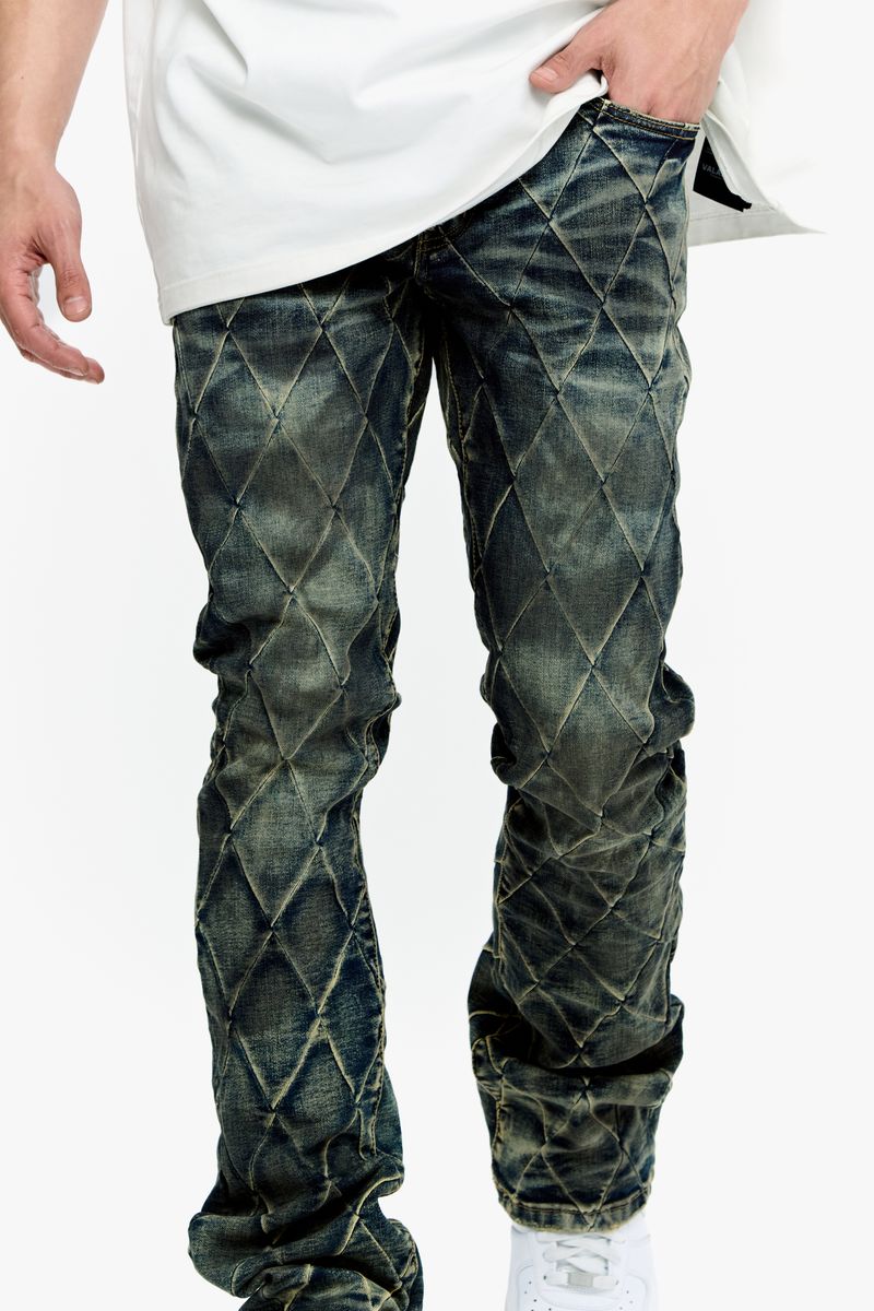 Valabasas Tire Blue Vintage Stacked Denim Jeans - Front View with Distressed Details and Classic Five-Pocket Styling