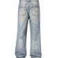 Denim jeans featuring light stone wash, heavyweight fabric, and side gemstone embellishments in Azul color