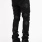  Close-up of the back pockets of Guapi All Black Icon Stacked Denim Jeans with embroidered logo