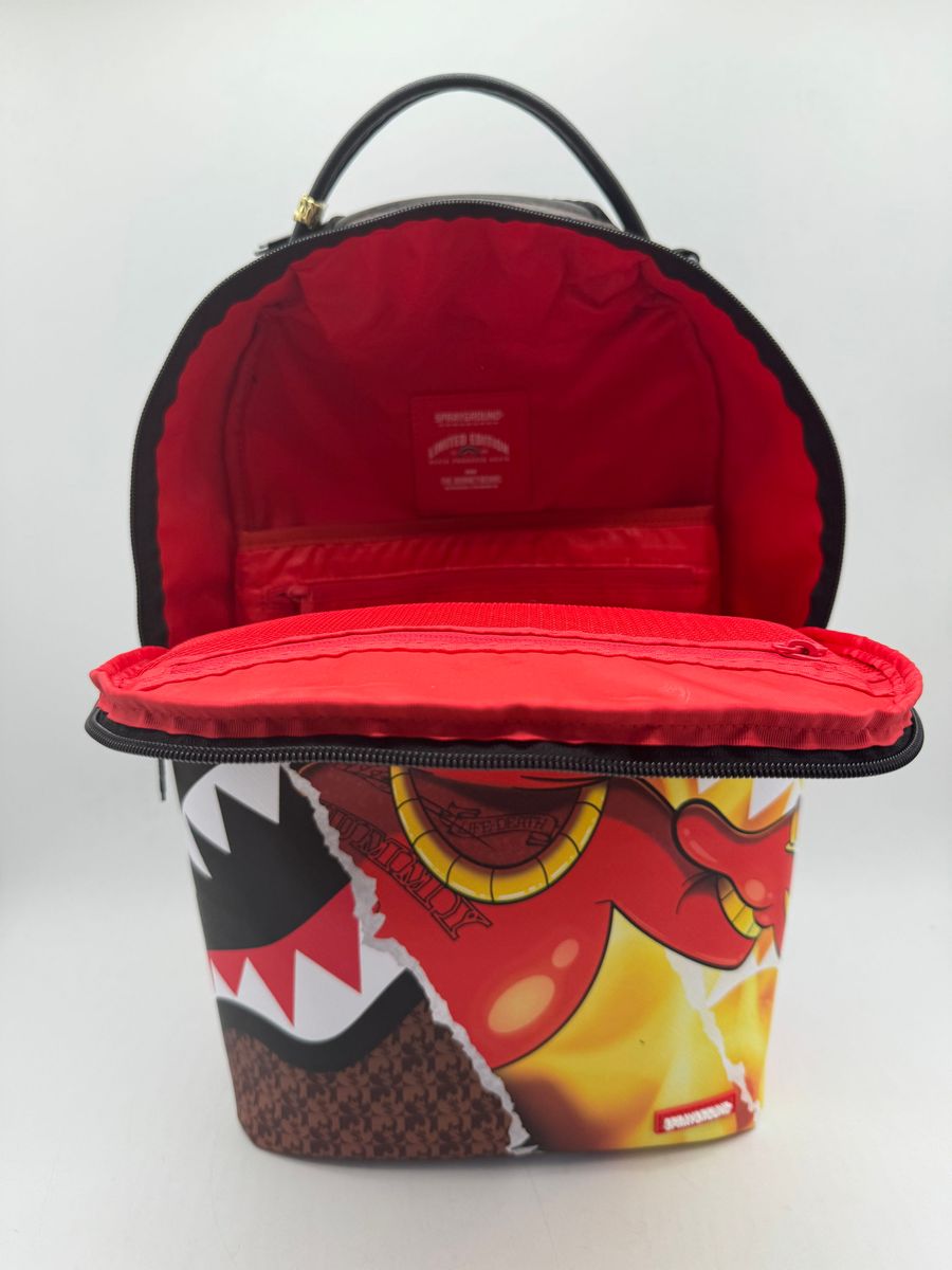 Front view of the Sprayground Diablo Fire Tear Backpack with spacious main compartment and sturdy dimensions of 18 x 115 x 65 inches