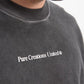 Close-up of the black fabric showing the 350 gr weight and smooth texture of the PURE Knockout Fight Black Tee