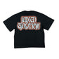 Close-up of the Twin Rhinestone Black Tee showcasing sparkling rhinestones and comfortable fit
