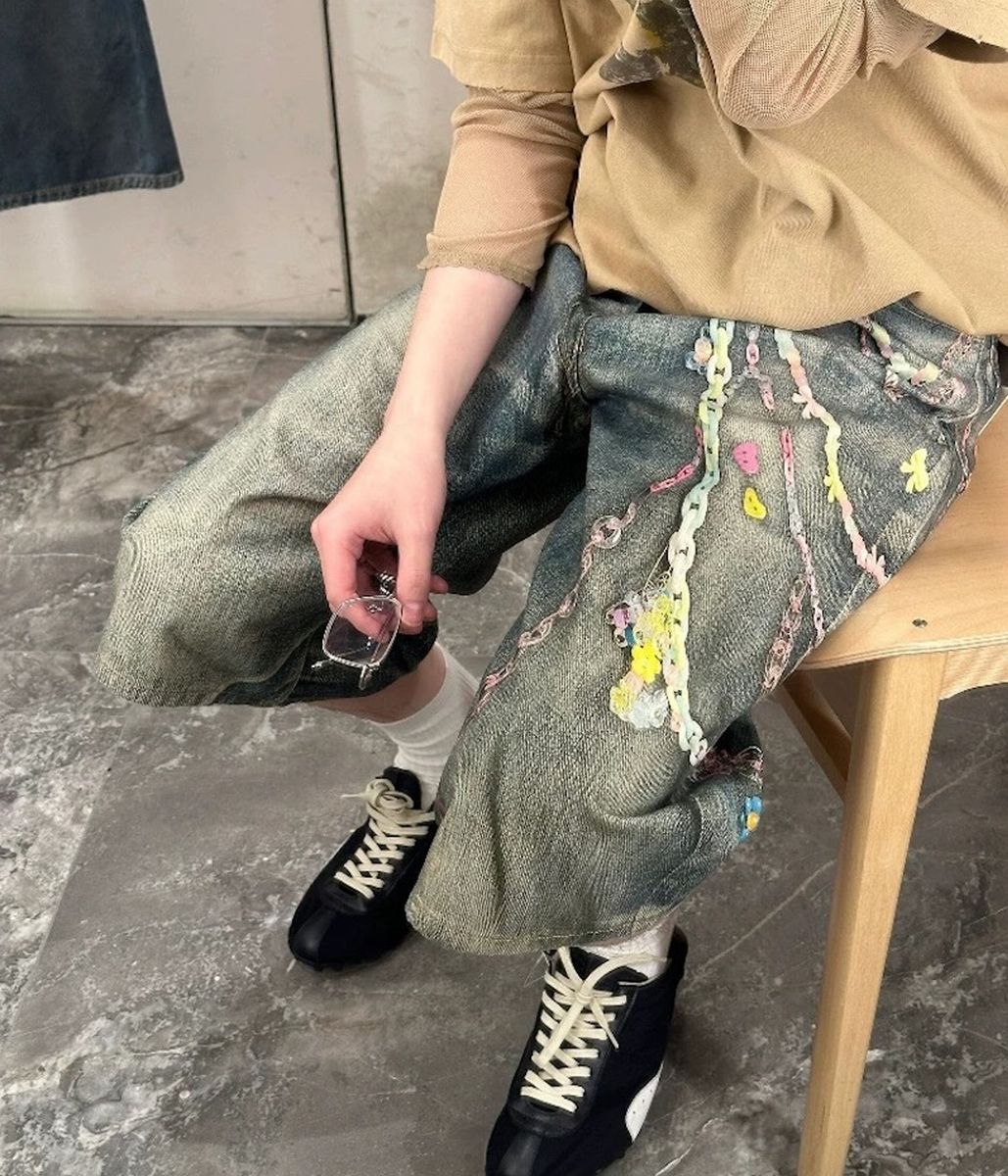 Unfinished Lucky Blue Denim Shorts featuring all over graphic design and sand blast wash