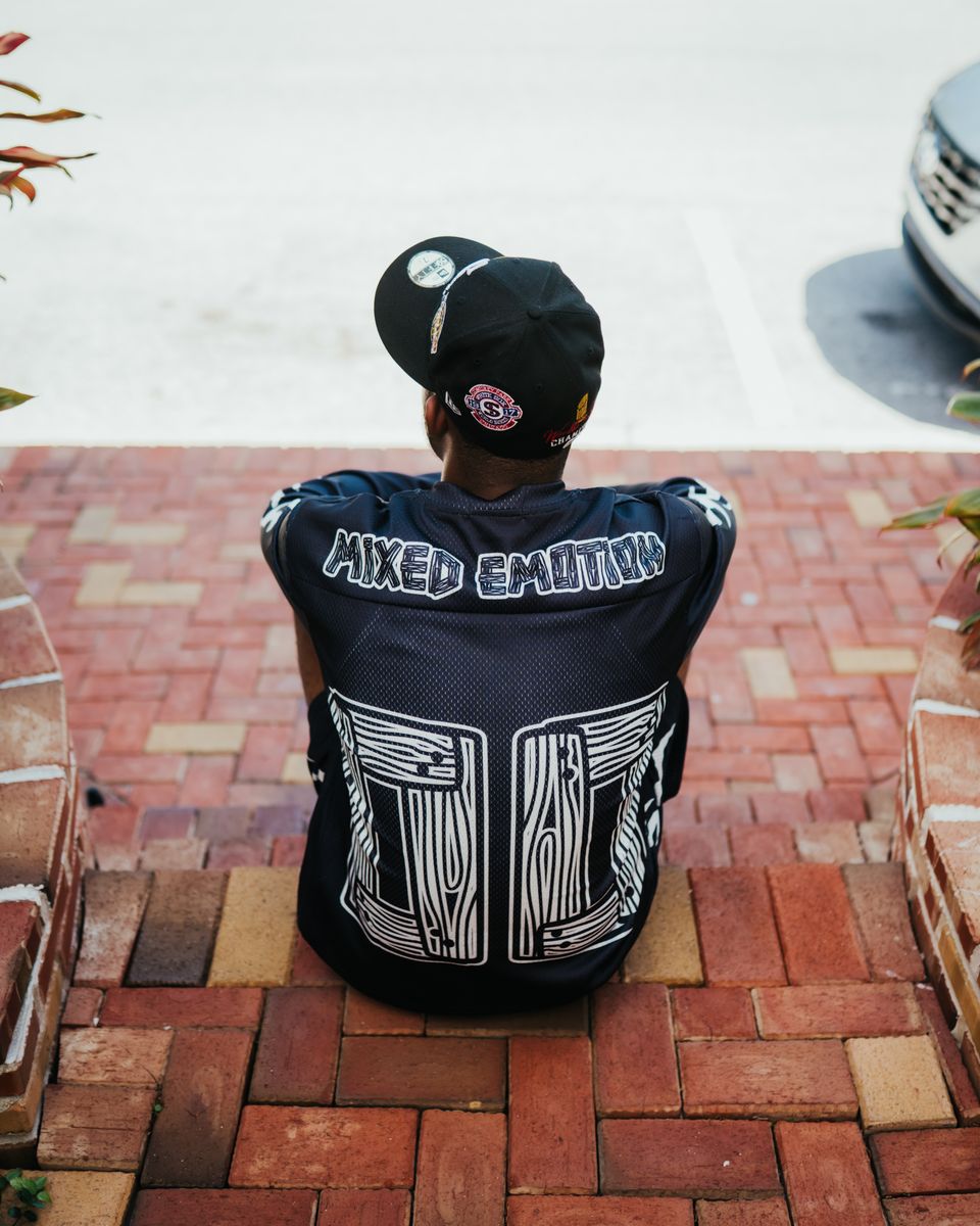 Stylish oversized black long sleeve with eye-catching lightning print, ideal for streetwear style