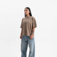 Full-length shot of the PURE Knockout Gloves Brown T-shirt emphasizing the oversized fit and comfortable cotton material