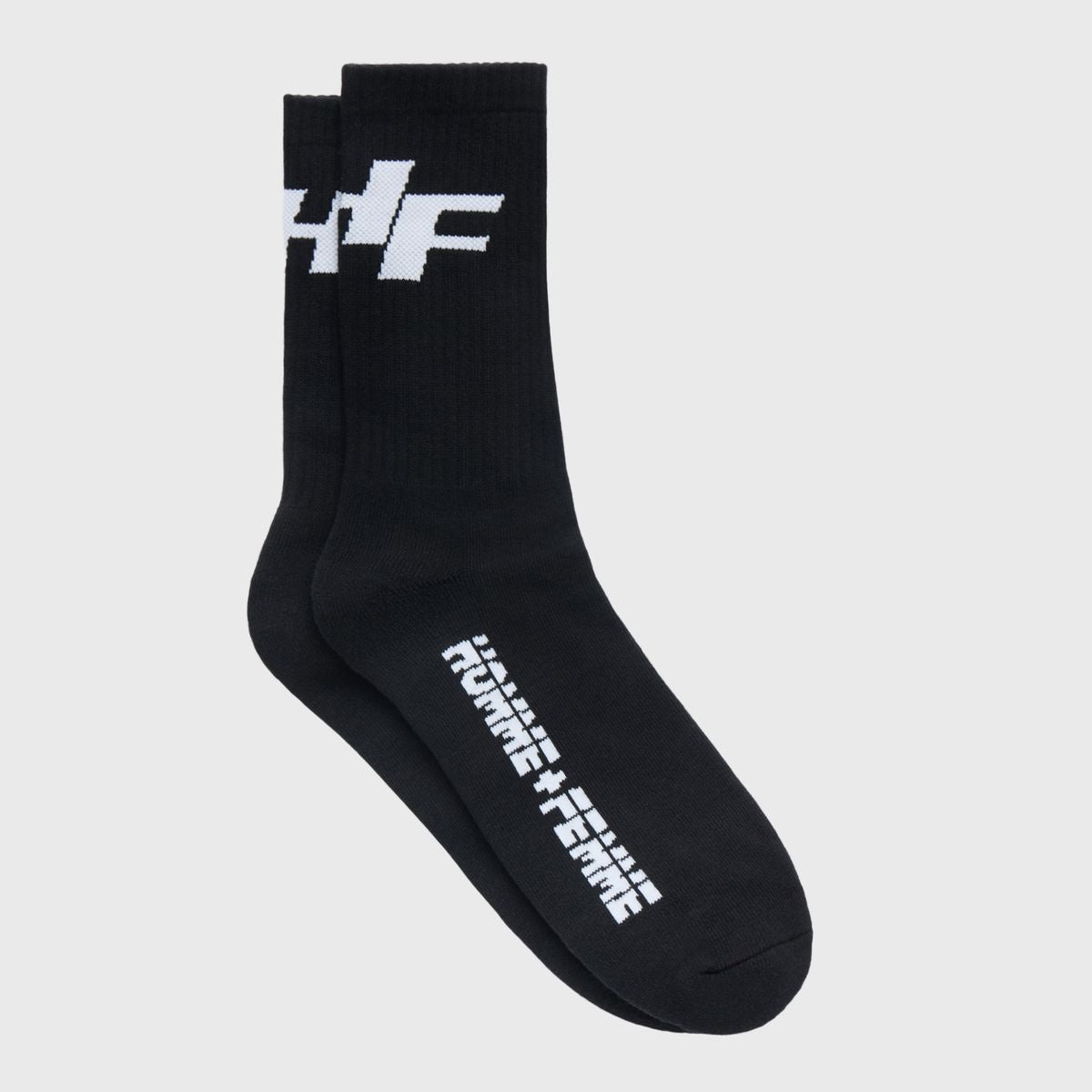 A pair of black and white Heatwave socks designed for both men and women, featuring a one size fits most fit and suitable for casual or athletic wear