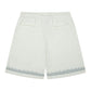 Close-up of the Almost Someday logo on the Daydream Cream Shorts with detailed stitching