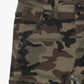 Full-length view showcasing the stacked flare style and unique camo print on Valabasas Commander 30 jeans