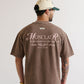 PURE Monclair Brown Tee front view showcasing oversized fit and classic brown color
