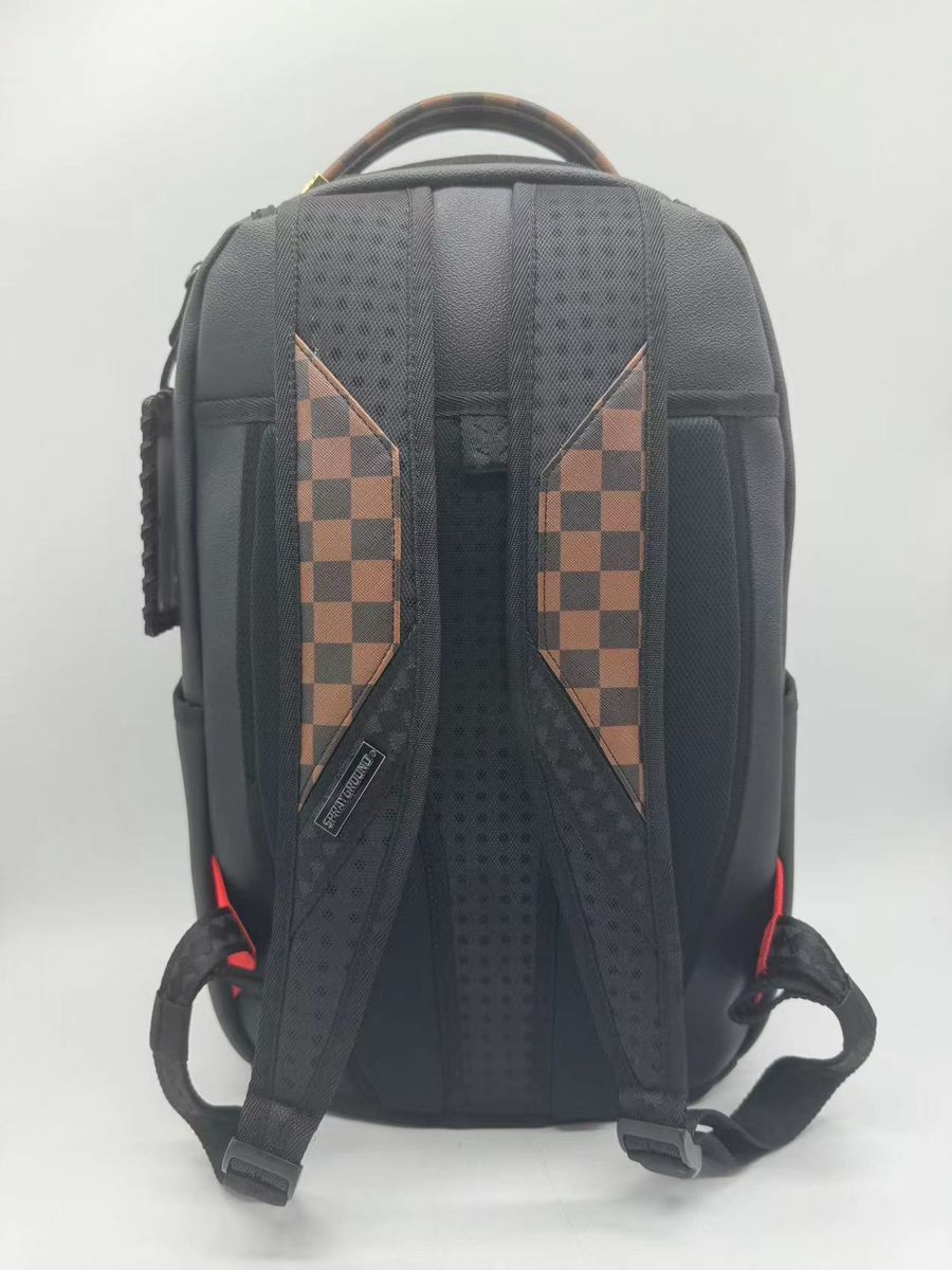 Side angle of Sprayground Dose Of Check Deux Backpack highlighting sturdy construction and size