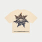 Bone-colored Godspeed Purple City T-Shirt featuring a striking art design and crown stones