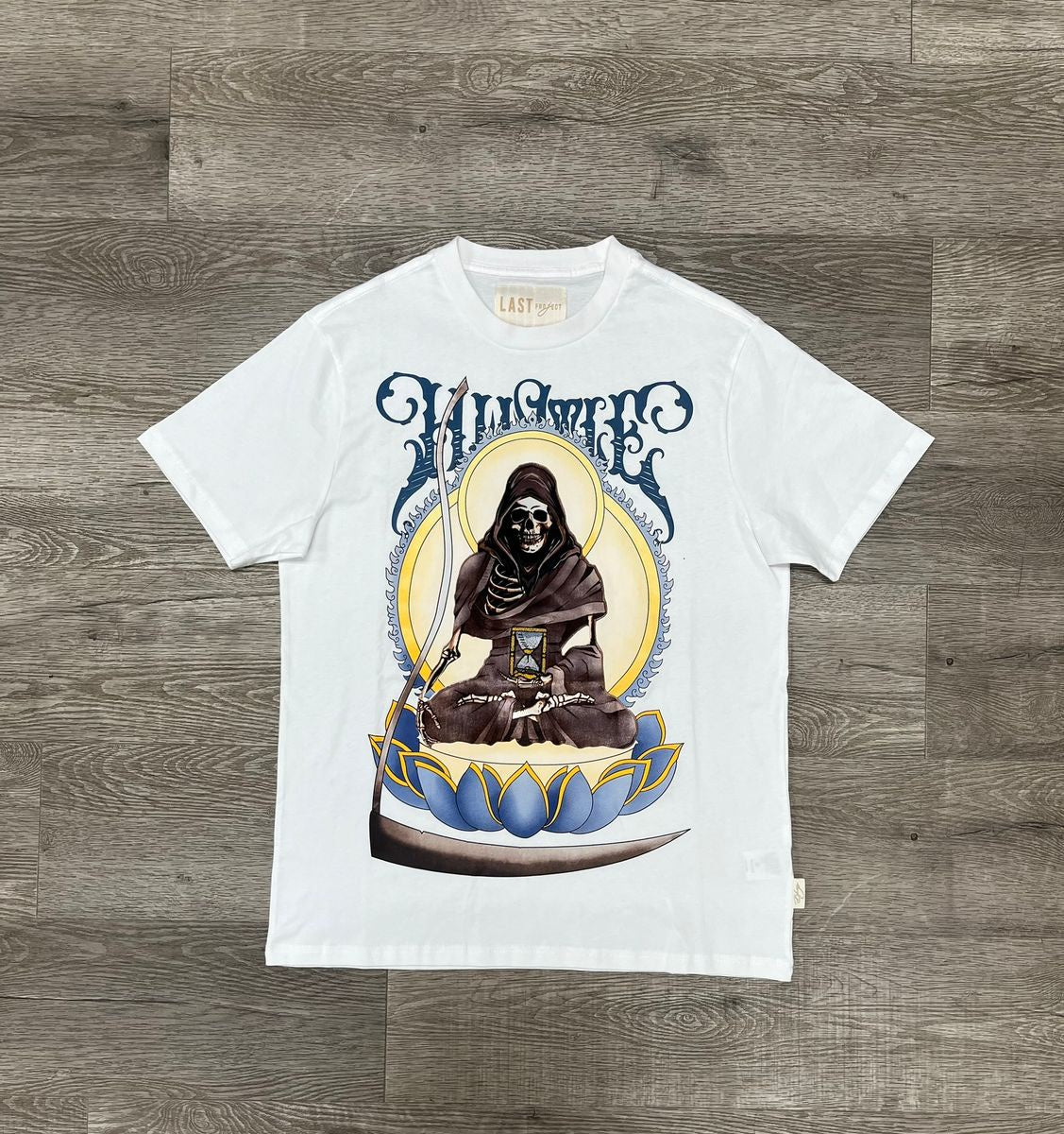 Oversized white tee featuring Last Project Skull Monk design on front