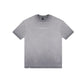  Side profile of the PURE Áurea Grey Wash Oversized Tee emphasizing its loose, comfortable fit and washed grey tone