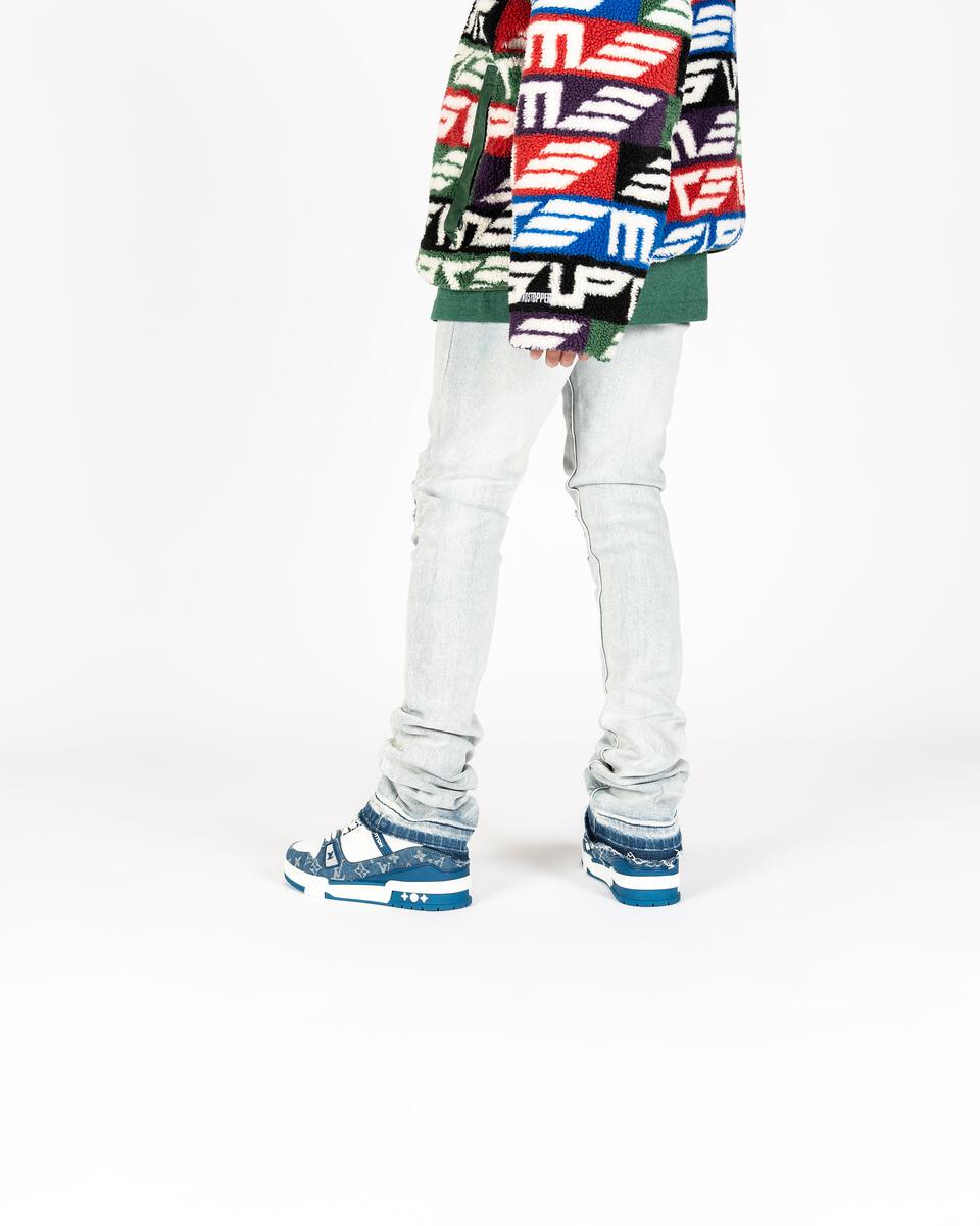 PHEELINGS Soulful Serenity Light Blue Flare Stack Denim - Front view of stylish light blue denim jeans with flared legs and stack design