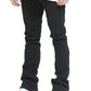 Valabasas Tire Jet Black Stacked Denim Jeans lifestyle shot with urban backdrop