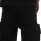 Close-up of Vicious VC950 jet black denim shorts featuring sparkling rhinestone details and stylish embellishments