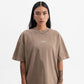 Close-up view of the PURE Knockout Gloves Brown Tee showcasing its oversized fit and high-quality cotton fabric