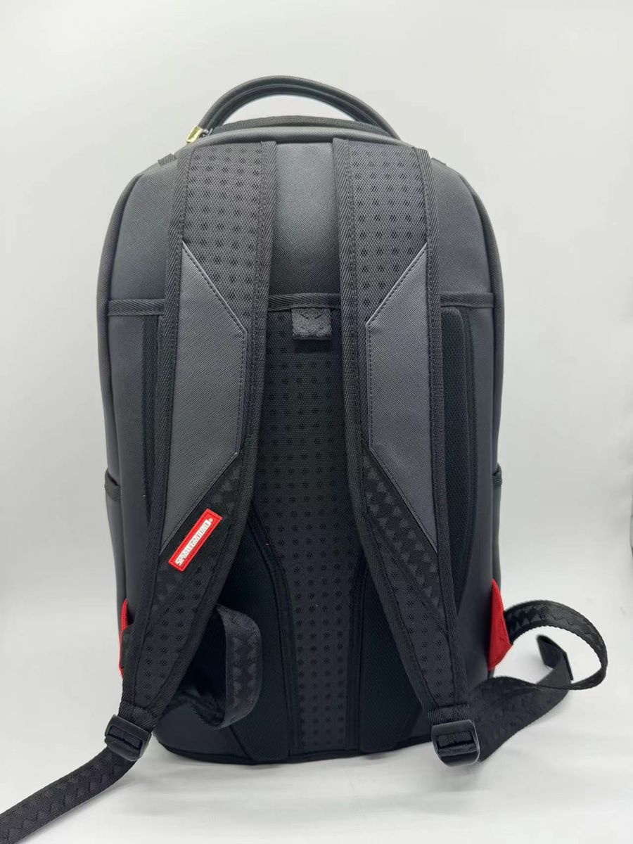 Large Sprayground Shark Central DLXSV backpack in midnight blue showcasing sturdy construction and functional dimensions