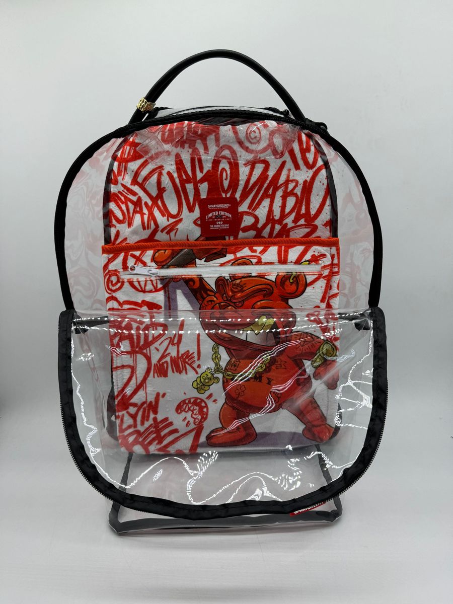 Front view of the 18x115x65 inch Sprayground Bear Grills Clear Backpack made from 100% PVC material