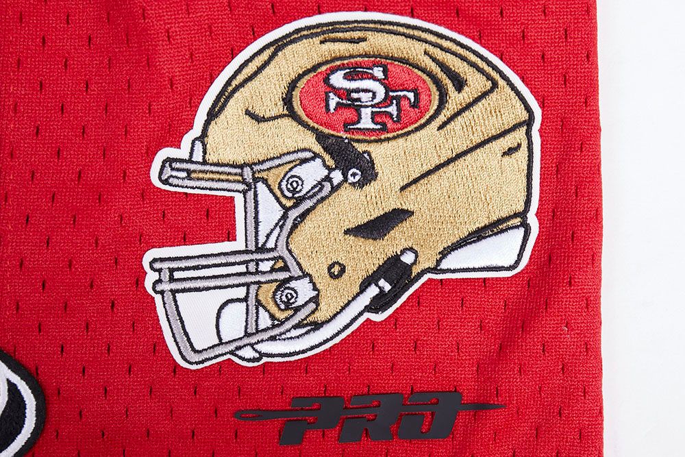 Detailed view of the San Francisco 49ers team logo printed on the shorts in red and white