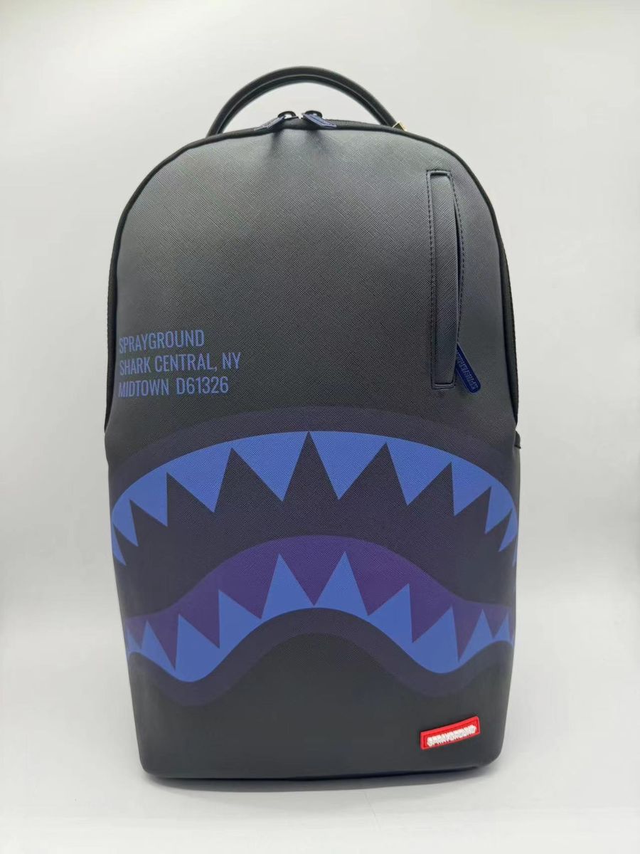 Midnight blue Sprayground Shark Central backpack with detailed shark graphic and ample storage capacity