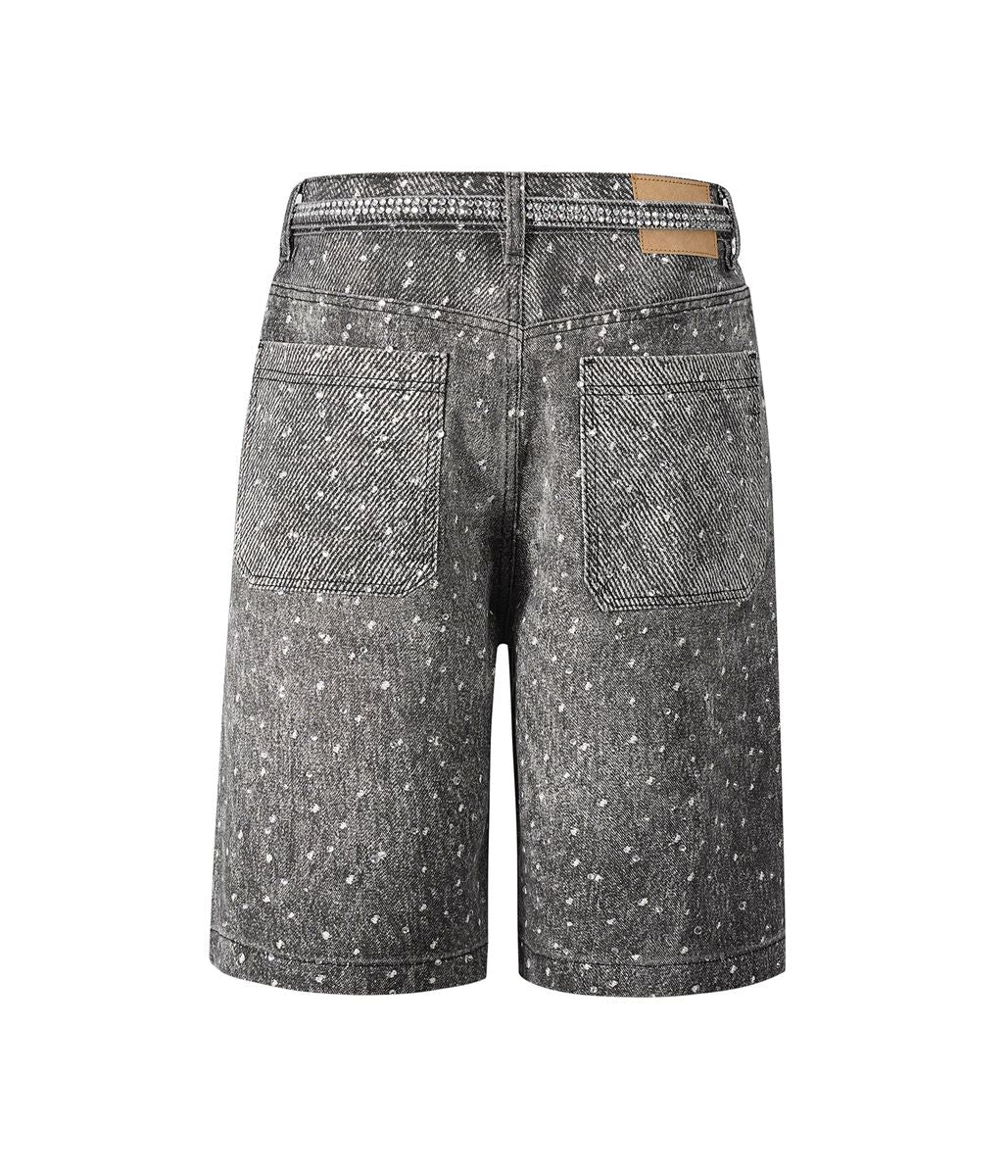 Close-up of baggy Noir Rhinestone Denim Shorts showcasing light stone wash, heavyweight denim, and intricate rhinestone embellishments with a removable belt