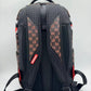 Full view of the Sprayground One Eye Brown Check Backpack highlighting its size, structure, and brown check pattern