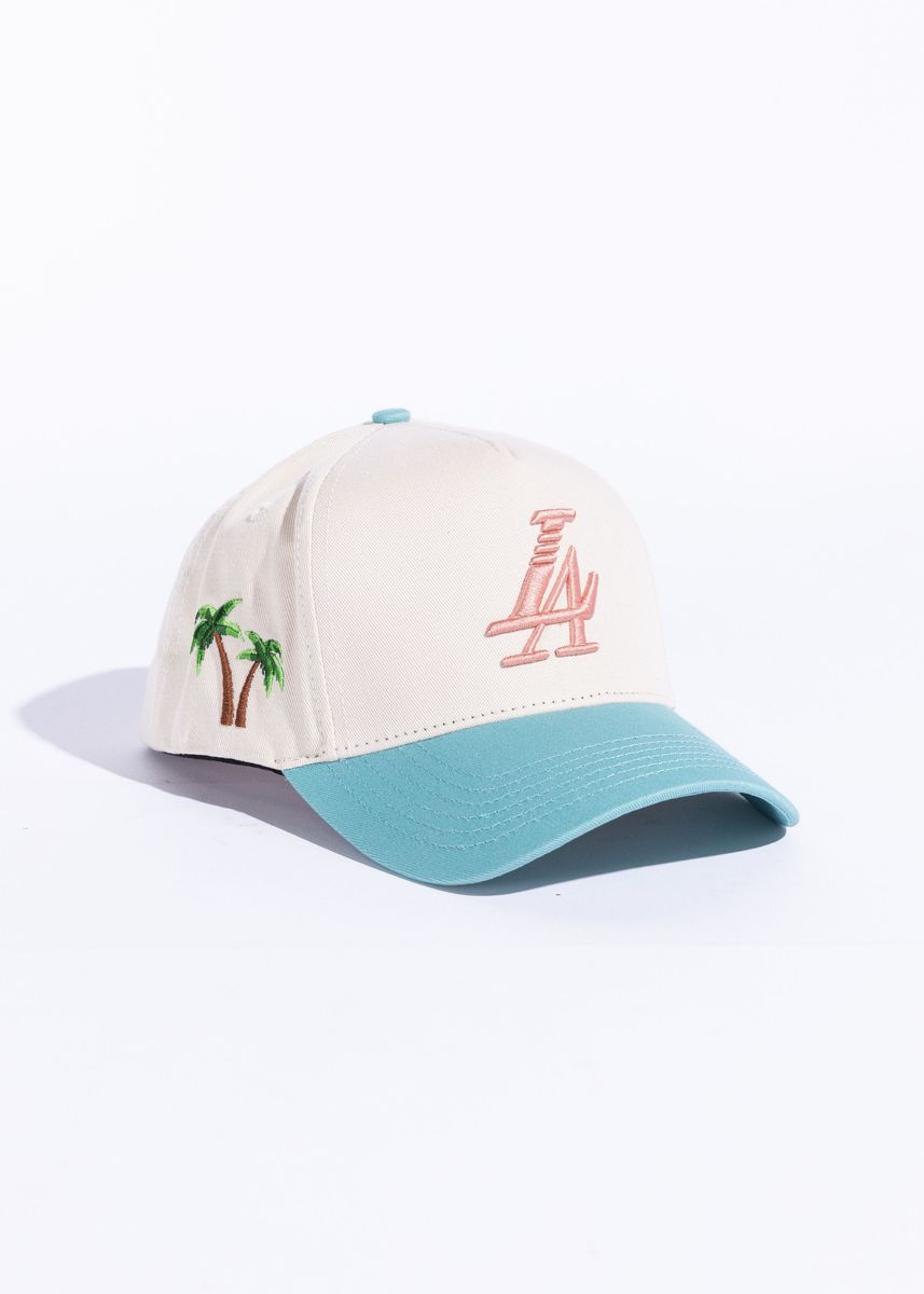 Cream snapback hat with teal and pink accents, featuring Paradise LA embroidery (REF609)