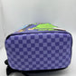 Close-up of the PVC material used in the Sprayground Reptar Chase Backpack, emphasizing its quality and textured surface