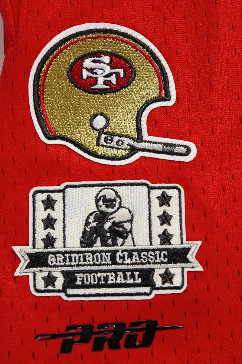 Pro Standard San Francisco 49ers Retro shorts featuring team emblem and nostalgic design in eggshell and red