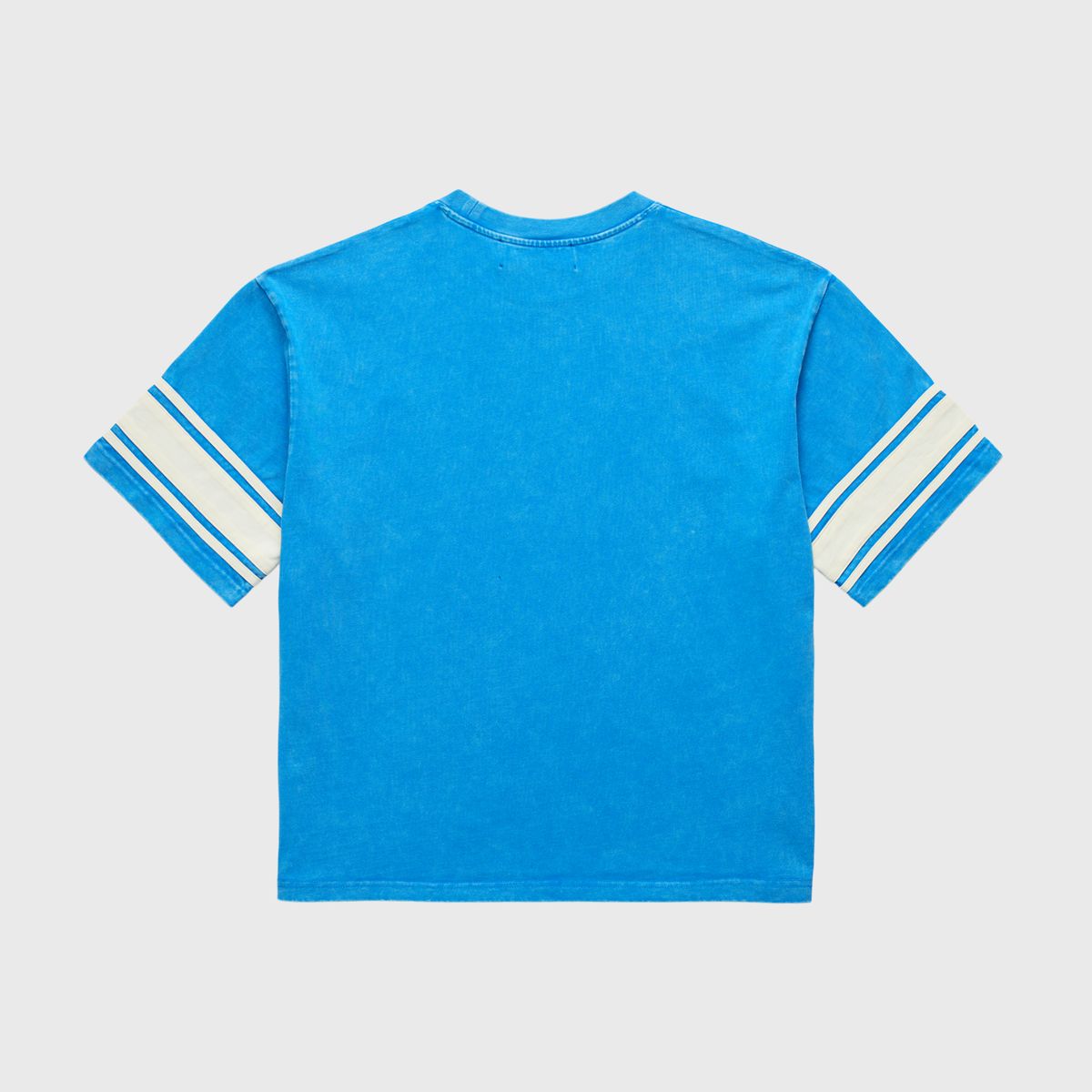 Stone-washed Homme + Femme Kansas cropped blue tee featuring vintage jersey vibe with heavyweight cotton and spring 2025 graphic collection design
