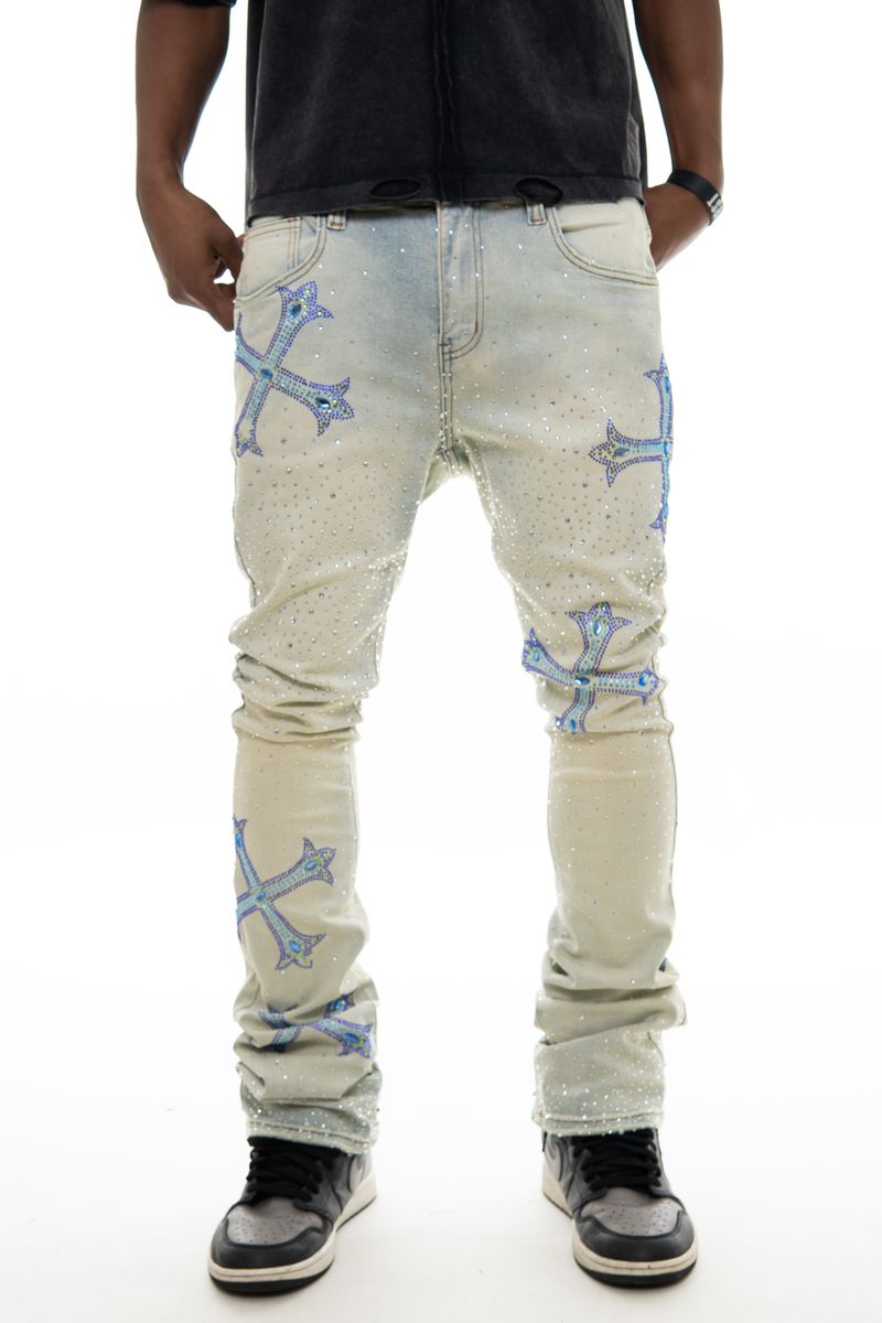 Close-up of Vicious embellished rhinestone light blue denim flare jeans showcasing detailed decoration and high-quality fabric