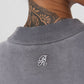 Close-up of the fabric highlighting the soft, textured 350-gram cotton material used in the oversized T-shirt