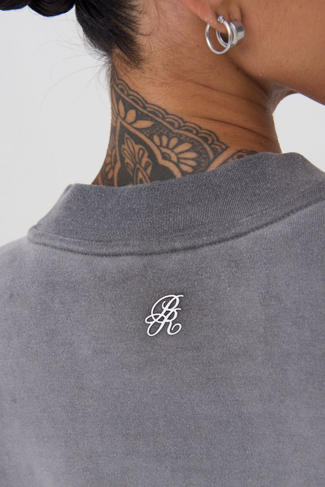 Close-up of the fabric highlighting the soft, textured 350-gram cotton material used in the oversized T-shirt