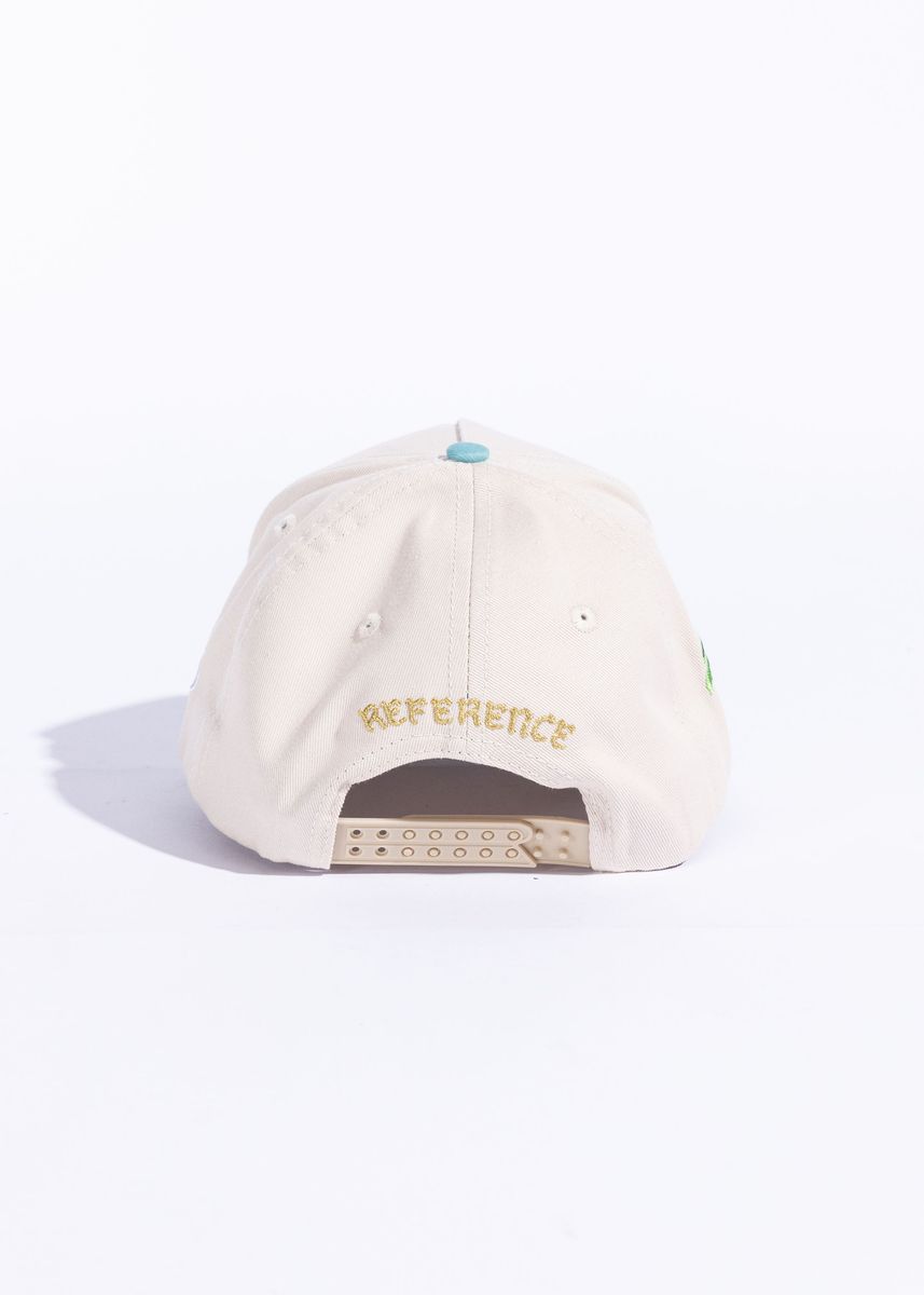 Reference Paradise LA Snapback Hat in Cream, Teal, and Pink with embroidered logo