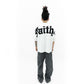 Labeled image of the Faith+Figures Faith+ Jumbo short sleeve tee displaying the product tag and material information